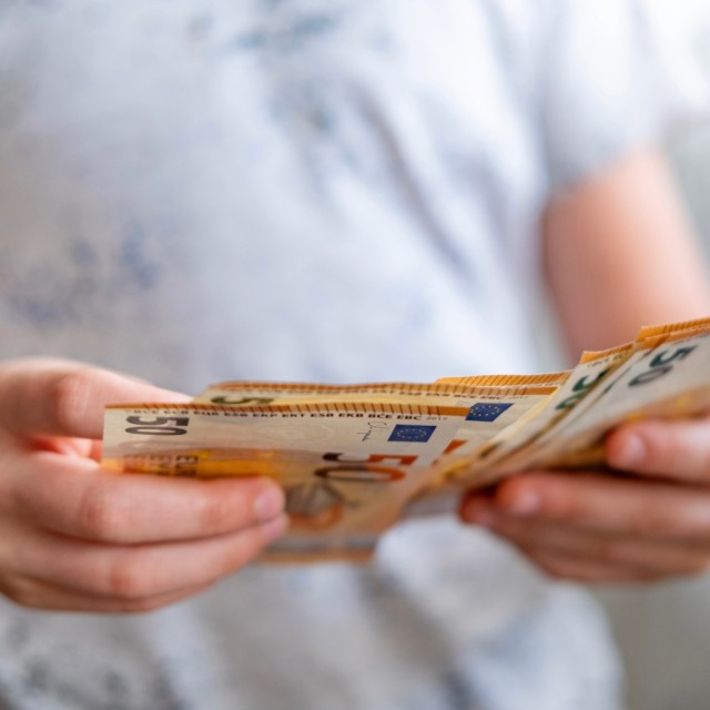 Child with euro bills